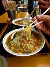 Japanese Food: Street Foods. 1. Yaki Imo Yaki Imo are baked sweet potatoes cooked over a wood fire. Yaki Imo trucks and carts fitted with wood stoves can be fou