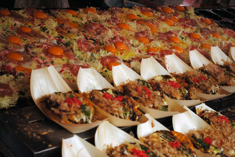 Japanese Food: Street Foods. 1. Yaki Imo Yaki Imo are baked sweet potatoes cooked over a wood fire. Yaki Imo trucks and carts fitted with wood stoves can be fou