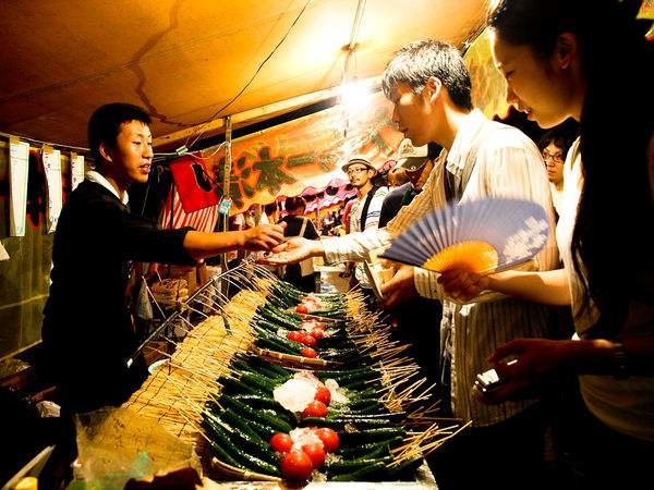 Japanese Food: Street Foods. 1. Yaki Imo Yaki Imo are baked sweet potatoes cooked over a wood fire. Yaki Imo trucks and carts fitted with wood stoves can be fou